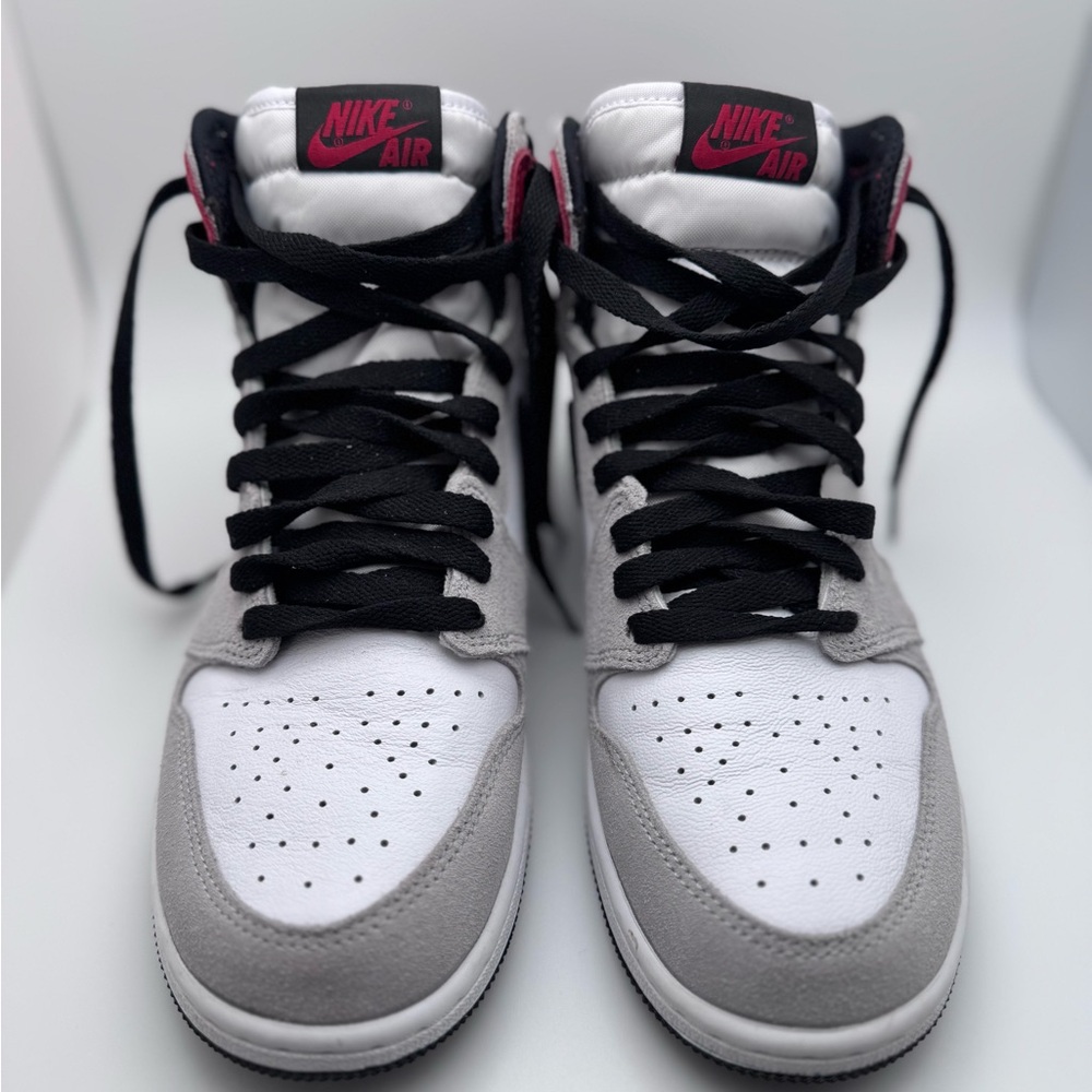 Nike Jordans in White, Gray, and Black with Red Accents